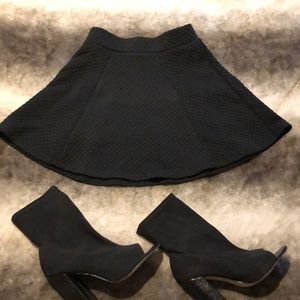 H&M black short bell skirt